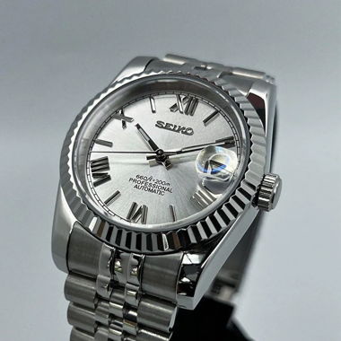 Patek Philippe Nautilus Mod “Roman White Dial”