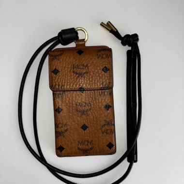 Custodia per telefono MCM con cordino