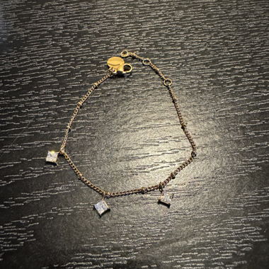 Gold-coloured Bracelet with Zirconia Charms
