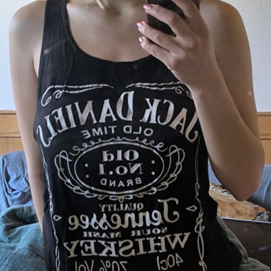 Top noir jack daniel sans manches