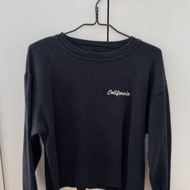 Schwarzes Sweatshirt