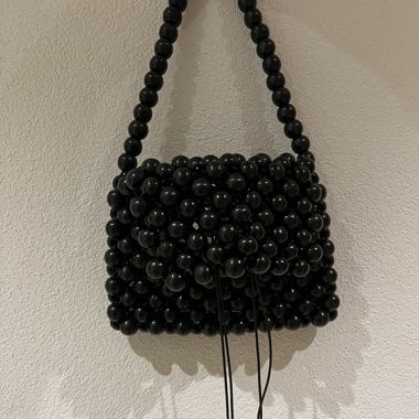 Tasche aus Holzperlen