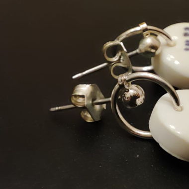 Earrings with a retro print of women