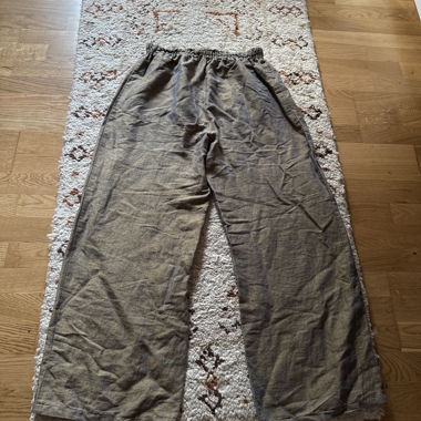 Pantalon ample en tissu doré avec effet scintillant