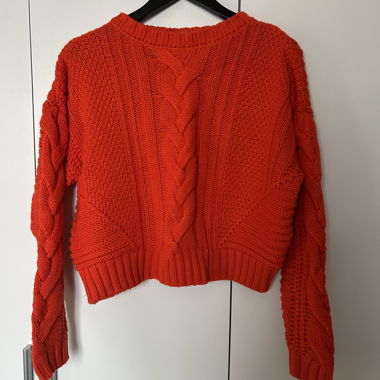 Red knitted sweater