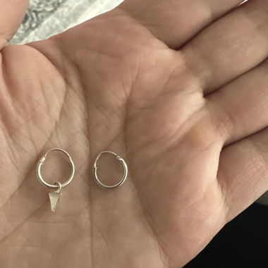 Silver-coloured creoles with pendant