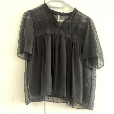 Blouse transparente noire à pois