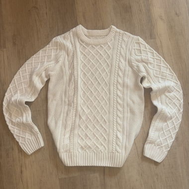 Maglione in maglia a trecce